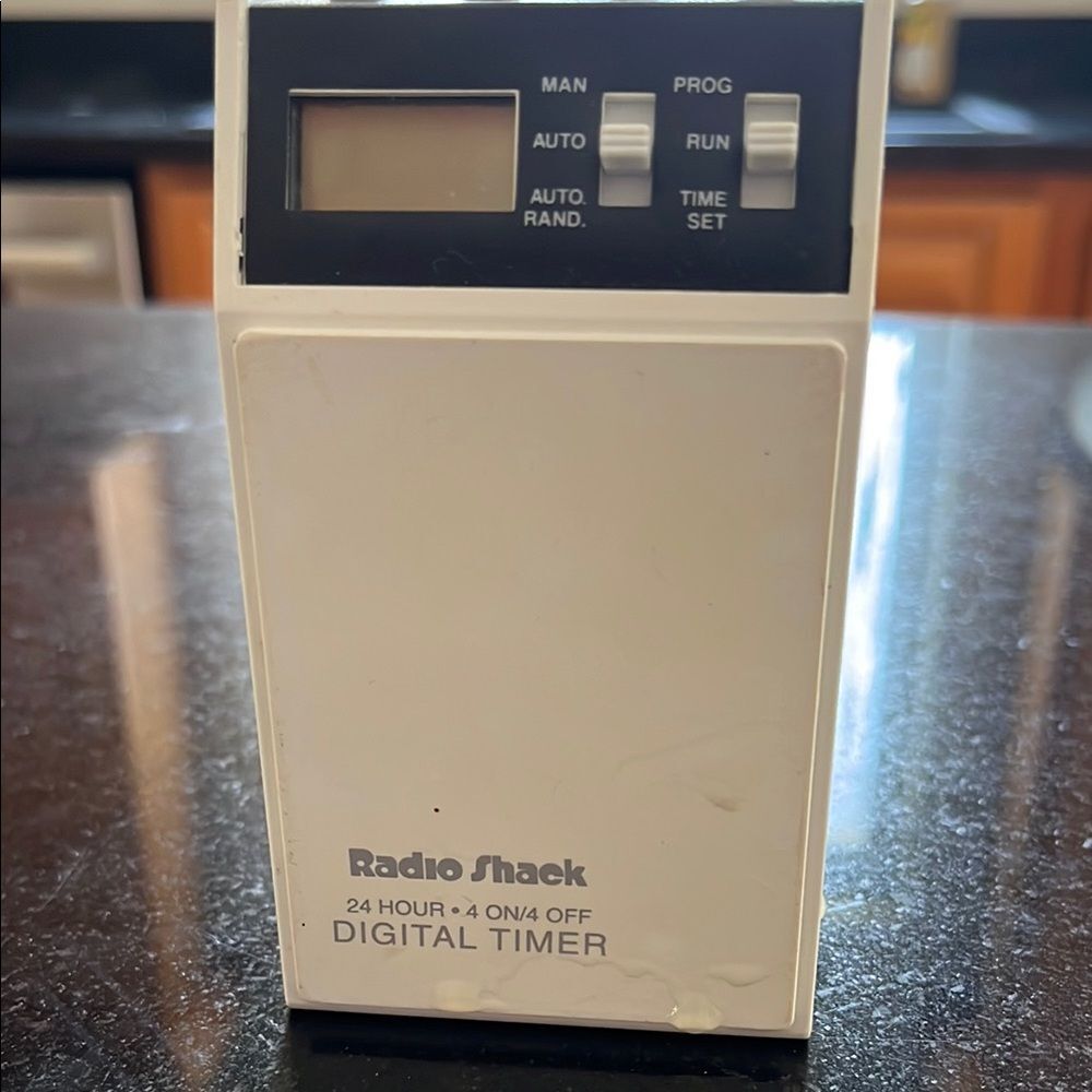 White Digital Timer catalog number 61–1060 24 hour four on four off